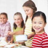 <p>Before getting started, form your cooking teams. For birthday parties, aprons can make great party favors and help keep clothes clean. Each team should have a teen or parent acting as sous-chef, handling the heavy knife work and any stove use. If you need extra hands, ask babysitters for help. Depending on how many guests you're expecting, and their ages, feel free to form three teams of two or two teams of three — mix it up however will work best.</p>