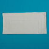 Fold the napkin in half.