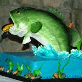 <b>The Bakers:</b> <a href="http://www.creativecelebrations.org/" target="_blank">Creative Celebrations</a>, Fort Walton Beach, FL<br />
<b>The Challenge:</b> Make this cake the catch of the day.<br />
<b>Fantastic Flavor:</b> "Forbidden" chocolate fudge cake with cheesecake filling<br />