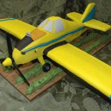 <b>The Bakers:</b> <a href="http://www.cakesbysam.com/" target="_blank">Cakes by Sam</a>, Cabot, AR<br />
<b>The Challenge:</b> Make a cake that leaves other cakes in the dust.<br />
<b>Fun Fact:</b> This sweet flyer was an exact replica of the groom's crop-dusting airplane.<br />
