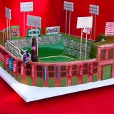 <b>The Bakers:</b> <a href="http://www.fleurdelisacakes.com/" target="_blank">Fleur de Lisa</a>, Santa Rosa, CA<br />
<b>The Challenge:</b> Hit a home run with this groom's cake.<br />
<b>Fun Fact:</b> Since all the accessories on this cake are handcrafted sugar work, the Red Sox-loving groom and his guests got to taste every bit of this cake.<br />