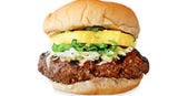 Top each burger with 2 tablespoons shredded pepper Jack cheese + 1/4 green onion, thinly sliced + 1 fresh pineapple ring.