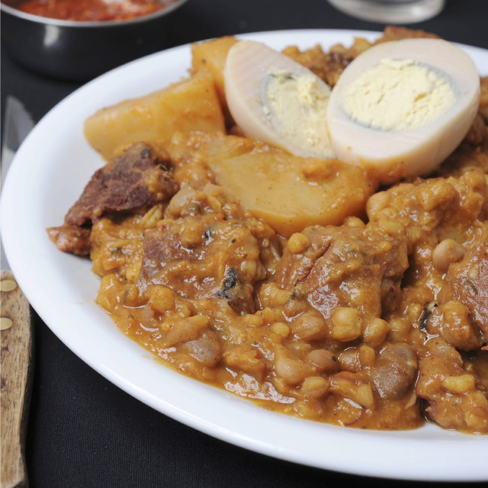 <b>Where:</b> Wherever Shabbat is observed<br />
<p>Similar to those who followed Puritan Sabbath laws, Ashkenazi Jews who observe the Shabbat do no cooking between sundown Friday and Saturday. But they don't go hungry for Saturday lunch, thanks to cholent, a long-, slow-simmered stew typically comprised of meat, vegetables, and a starch like barley. </p>
<p><strong>Try it at home with our recipe for </strong> <a href="http://gogonow.org/recipefinder/beef-barley-vegetable-stew-1210%22 target="_blank"><strong>Beef-Barley and Root Vegetable Stew</strong></a></p>
