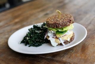 <p>Vegetarians, you're not exempt from the sport of outrageous burger eating! <a href="http://truefoodkitchen.com/" target="_blank">True Food Kitchen</a> stacks hummus, tzatziki, tomato, cucumber, red onion, avocado (the butter of the vegan world) and feta between two quinoa patties for super-sized, gourmet version of the meat-free staple. In the age of bread-less tiered burgers and sandwiches, this is one you can actually feel good about devouring.</p>
<p><em><strong>True Food Kitchen:</strong> multiple locations; <a href="http://truefoodkitchen.com/" target="_blank">truefoodkitchen.com</a></em></p>