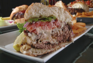 <p>Butter isn't the only thing you'll find hiding in burgers! At <a href="http://www.citystreetsrestaurant.com/" target="_blank">City Streets Restaurant</a>, they take the classic combo you love in a cheeseburger and transform it into a patty stuffed with warm, gooey mac and cheese. Step aside, surprise-inside cakes! These savory bites have you beat.</p>
<p><em><strong>City Streets Restaurant:</strong> 249 Lexington Street, Waltham, MA 02452; (781) 647-2489; <a href="http://www.citystreetsrestaurant.com/" target="_blank">citystreetsrestaurant.com</a></em></p>