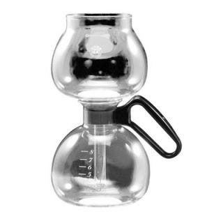 The vacuum coffeemaker, also known as a siphon coffeemaker, is similar to the Italian stove-top espresso maker. It's set over a stove burner and pressure forces water from the lower chamber into the upper chamber containing the ground coffee. The difference is, it's made of glass, and after it is removed from heat, the coffee filters back down through a filter into the bottom chamber where it is ready to be served. The chambers are also microwave-safe, making reheating a lot easier.