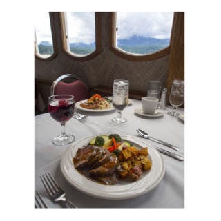 The Columbia River gorge, which flows from the Sandy River in Washington to the Deschutes River in Oregon, is designated as a National Scenic Area. The "Gorge"ous Dinner Cruise in Portland, Oregon allows you to check Columbia River Gorge off your list of must-sees while you dine comfortably aboard a Portland Spirit cruise ship. Enjoy northwestern inspired fare with dishes like balsamic-marinated rack of lamb in sweet hot mustard sauce prosciutto and basil stuffed chicken breast with roasted garlic cream sauce – "delish"ous!