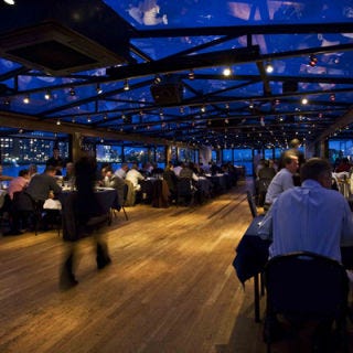 <p>Not sure who could resist the luxury of seeing London Bridge from aboard a ship on the river Thames – and they don't have to. You'll feel like a British royal aboard a majestic Thames Dinner Cruise – a very well fed British royal! The menu features items such as slow-roasted pork belly, almond crusted sea bass, and blackberry and raspberry millefeuille. If you're feeling even more celebratory, the "elite" cruise dinner includes champagne on arrival, guaranteed window table, and live jazz entertainment! Not sure any pub in London could boast that!</p><p><a href="http://www.thamesdinnercruise.co.uk/dinner.htm" target="_blank">thamesdinnercruise.co.uk/dinner.htm</a></p>
