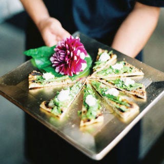You might love foie gras and cheese grits, but they're not necessarily great together. Picking a theme before you set the menu will help ensure the dishes you choose work together and set the tone for the entire evening. We're not saying you need to break out the maracas and sombreros, but a common idea will tie the menu together. Pay tribute to your heritage with ethnic choices, like Mexican, Italian or Japanese food. Or add a personal touch by creating a menu filled with your childhood favorites, dishes served at your parents' weddings or foods from memorable moments throughout your relationship. When you're interviewing caterers, bring up any themes you're considering so you can pick a chef who specializes in the type of cuisine you want.