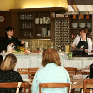 <p>Does your kitchen have a spectacular view? <a href="http://www.crescentcitycooks.com/" target="_blank">Crescent City Cooks'</a> kitchen certainly does. Smack on top of the New Orleans' Industrial Canal, this cooking classroom gives prospective cooks the opportunity to learn some of the signature dishes (i.e. Etoufée, Jambalaya, Gumbo) that make N'awlins such an outstanding culinary destination. Owner Nita's warm personality and small class sizes keep the intimate vibe, and prices range from  $30 for a demonstration, where you can let the chefs do the work, to $150 for a hands-on class.</p>
