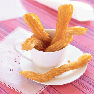 <p>Swimming is an easy and much-used deep-frying technique. It involves dropping foods into a hot fryer or pot of oil with a pair of tongs, spider, or other tool — when first dropped, foods fall down toward the bottom of the pot, but then swim to the top as they cook. It works especially well for battered or tempura-battered items. If items quickly float to the surface, turn them halfway through cooking in order to make sure that all sides cook evenly. When you're using this method, it's also important to beware of splatter and keep your face away from your pot or deep-fryer — burning hot oil is dangerous and can cause serious injury. </p><p><b>Recipe:</b> <a href="/recipefinder/piped-doughnuts-orange-glaze-3777"><b>Piped Doughnuts with Orange Glaze</b></a></p>