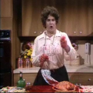 1978: Parodied On <i>Saturday Night Live</i> <p>With her distinct sing-songy voice, Julia Child was often imitated — all in good fun. The icon was even parodied by comedian Dan Aykroyd on <i>Saturday Night Live</i> in 1978. In the skit, Aykroyd, donning a wig, skirt, and well-stuffed bra, cleaned a bird while recommending to save the liver for liverwurst to spread on a Ritz crackers or to make chopped liver in the shape of a friend's head or to serve to your cat or dog. He also reminded the audience to use a very, very sharp knife until "cutting the dickens" out of his finger and hilariously proceeding to gush blood all over the chicken and the countertop, all while insisting, as Julia would, to remember to "save the liver." Years later, in an interview, Julia admitted the parody was "terribly funny."</p>