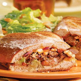 <p>A torta is the Mexican version of a panini — a pressed sandwich made with crusty bread that can have an endless array of fillings. For this one, we make our own chorizo-inspired filling by spicing up ground pork or turkey. Use a panini maker if you have one (and skip Step 4) or use our technique for making pressed sandwiches without any special equipment. Serve with a mixed green salad.</p>
<p><strong>Recipe:</strong> <a href="../../../recipefinder/homemade-chorizo-tortas-recipe-ew0611" target="_blank"><strong>Homemade Chorizo Tortas</strong></a></p>