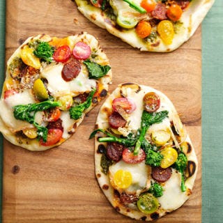 <p>Use naan flatbreads and prepared pesto sauce for a fast and easy pizza. Try the chorizo and broccoli rabe as spicy and hearty toppings.</p>
<p><strong>Recipe:</strong> <a href="../../../recipefinder/chorizo-tomato-cheese-pizza-recipe" target="_blank"><strong>Chorizo, Tomato, and Cheese Pizzas</strong></a></p>