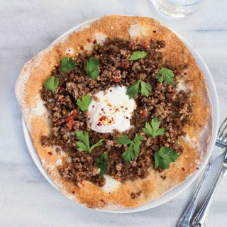 <p>At her takeout shop in Istanbul, Kantin Dükkan, Semsa Denizsel tops her pizzas with ground lamb (flavored with sweet sun-dried tomatoes and a little spicy red pepper), but you can substitute ground beef instead.</p>
<p><b>Recipe: </b><a href="/recipefinder/turkish-ground-lamb-pizzas-recipe-fw0512" target="_blank"><b>Turkish Ground-Lamb Pizzas</b></a></p>