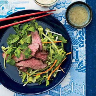 <p>For a pretty blend of colors as well as flavors, Sang Yoon lays slices of cumin-spiced lamb on a bed of jicama, carrot, and lettuce. "Lamb seasoned with cumin is very Indian, as well as Sichuan and Yunnan. But no one in Asia would serve lamb on a salad; that's just me being Californian," Yoon says. </p><p><b>Recipe:</b> <a href="/recipefinder/grilled-lamb-salad-cumin-vinaigrette-recipe "><b>Grilled Lamb Salad with Cumin Vinaigrette</b></a></p>
