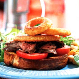 <p> When hunger comes calling, we opt for our favorite kind of golden rings: onion! This hefty <a href="recipefinder/the-ultimate-steak-sandwich-salad-italienne-recipe-121196" target="_blank"><b>Ultimate Steak Sandwich with Salad Italienne</b></a>, stacked high with crispy rings, is a quick and easy dinner to serve the kids before you head out to an adults-only holiday party.</p>  												