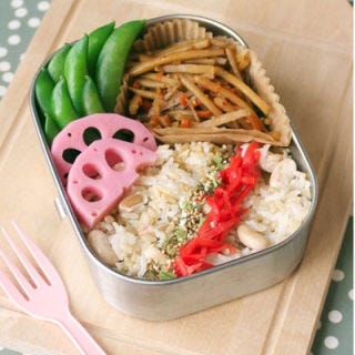 A more traditional bento of burdock and lotus roots gets its stripes from Japanese pickles and sprinkled seasonings.