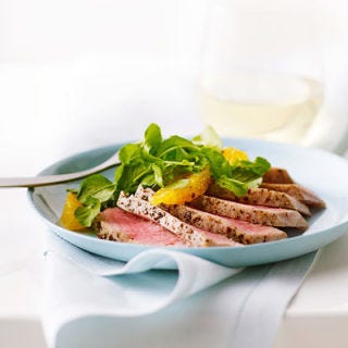 <p>This vibrant salad recipe contrasts flavor, texture, and color — the velvety tuna steak is matched with crisp, peppery watercress and the floral tart-sweetness of blood oranges and aniseed. Blood oranges, available December through March, make the dish especially pretty. If you can't find them, use any oranges that look good.</p><p><b>Recipe:</b> <a href="/recipefinder/orange-watercress-tuna-salad-recipe-ew0912" target="_blank"><b>Orange, Watercress, and Tuna Salad</b></a></p>