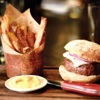 <p><b>Thrice-cooked chips, $9</b></p><p>Chef April Bloomfield may have built the perfect french fry for her New York gastropub at theAce Hotel — thick, full-length sticks of skin-on Idaho potatoes that are boiled, blanched in peanut oil, and then fried once more before serving. These viscously crisp, unabashedly salty lengths are served like a bouquet of flowers in a paper cone stuffed into a copper vessel, with a pot of cumin mayo on the side.</p><p><a href="http://www.thebreslin.com/" target="_blank"><i>thebreslin.com</i></a></p>