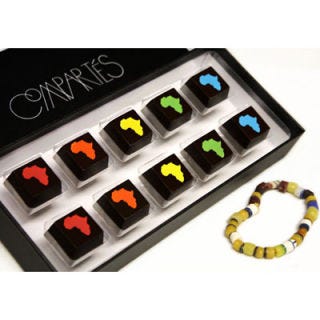 <p>If you're looking to get a "wow!" when the wrapping paper comes off, look no further. These caramels really make an impact - visually and philanthropically - making them the perfect sweet surprise for the culinary inclined on your nice list. Proceeds help Relief International fight hunger and malnutrition in Darfur and the included bracelet is made by local African women. Find out more about the effort of Relief International <a href="http://www.ri.org/who_we_are/our-approach.php" target="_blank">here</a>.</p>
<br />
<p>Chocolates for a Cause ($30, <a href="http://compartes.com/products/chocolates-for-a-cause" target="_blank">compartes.com</a>)</p>