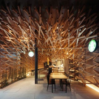 Coolest Starbucks: Dazaifu, Japan <p>Before some North American cities had a Starbucks to call their own, the coffee giant opened its first international location in Tokyo, Japan. Since 1996, the company has opened roughly 2,000 stores in Asia alone. One is in the small Japanese city of Dazaifu, where they hired internationally renowned architect firm Kengo Fuma & Associates to design a modern branch of the café. Though clearly innovative, the Starbucks stands in a location that was established in 919 A.D. on the main approach to the Dazaifu Tenmangu, one of the most important shrines in Japan. The only Starbucks of its kind, it features walls covered in a matrix of more than 2,000 wooden batons that shoot out from the storefront's facade and create a cave-like interior. </p><p><i><a href="http://www.starbucks.com/store/3523/" target="_blank">Starbucks Dazaifu</a>, 306-15, Mukaizano, Dazaifu, Fukuoka</i></p>