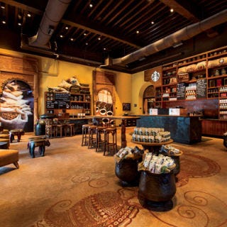 First Starbucks in India: Mumbai, India <p>In October 2012, India's residents got a sip of Starbucks on their own turf when the chain opened its first outlet in the country's most populated city, Mumbai. It was also the first time Starbucks served a Tandoori Paneer Roll alongside a Caramel Macchiato. How else does the Mumbai location differ from those in the U.S.? Coffees are served in glass mugs and everything from the floor to the furniture was created by local craftsmen and artists. Since 2012, the coffee giant has continued expansion in India, opening a shop for the people of New Delhi in February 2013, with even more stores to come.</p><p><i><a href="http://www.starbucks.in/" target="_blank">Starbucks Mumbai</a>, Elphinstone Building, Fort, 10 Veernariman Road, Mumbai, India</i></p>