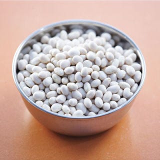 The haricot bean family includes navy beans for Boston baked beans and Great Northern for French cassoulet as well as cannellini. All are mild-flavored white beans which can be interchanged with each other.