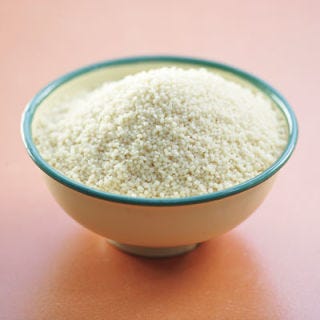 The staple cereal of North Africa, made from fine semolina. It is steamed over the pot in which the meat and vegetables are cooking, or, for sweet couscous, over water, then mised with sugar, nuts, and fruits.