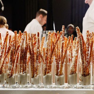Attendees won't want to skip the bread bowl this year, as it includes Wolfgang's grissini, or Italian-style breadsticks, covered in shaved fresh Parmesan and truffles.
