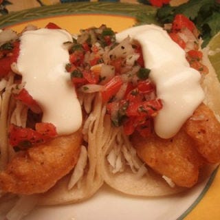 <p>The best fish tacos in Miami come by way of another coast. Jefe's bright orange truck serves classic California-style tacos: lightly fried beer-battered fish is topped with crisp shaved cabbage, fresh pico de gallo, and house-made Mexican crema, all bundled in two corn tortillas. Jefe's changing Miami locations are constantly updated on Twitter.</p><p><a href="http://www.jefesoriginal.com" target="_blank"><i>jefesoriginal.com</i></a></p>
