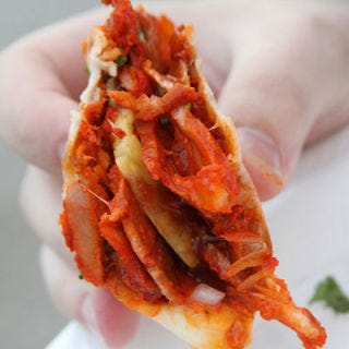 <p>When Los Gauchos upgraded from a swamped truck to an actual storefront in 2011, it did more than add seating: The menu expanded to burritos and quesadilla-like sincronizadas. But the undisputed favorite is still the Al Pastor taco: soft corn tortillas filled with tender slices of pork and a sliver of pineapple — grilled before 4 pm and sliced from a rotating spit after.</p><p><i>614-538-0211</i></p>