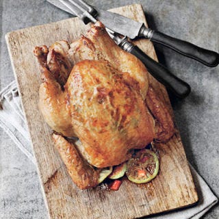 <p>Rotisserie chicken can make a great meal in a pinch, but the store-bought versions usually have huge amounts of sodium, and can also be injected with broths loaded with preservatives or other chemical flavor enhancers. To cut the salt in a big way, roast chicken at home — it does take a little more time, but you can pop one in the oven and take care of other things at home while it cooks. For added flavor and moisture, without the salt, stuff the cavity with fresh vegetables like onion or carrot, garlic, green herbs, and lemon, or use spices, like the chiles called for in this recipe.</p>
<p><strong>Recipe: <a href="http://gogonow.org/recipefinder/thai-roast-chicken-recipe-clv0511%22 target="_blank">Thai Roast Chicken</a></strong></p>
