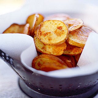 <p>Instead of buying packaged chips or getting fast-food french fries, bake these beloved treats at home. In this recipe, malt vinegar brings out the delicious potato flavor of these homemade chips, so you could easily halve the amount of salt called for, and still enjoy chips that are loaded with savory flavor — you won't miss the stuff out of a bag one bit.</p>
<p><b>Recipe: <a href="http://gogonow.org/recipefinder/potato-chips-malt-vinegar-recipe-mslo0111%22 target="_blank">Potato Chips with Malt Vinegar</a></b></p>