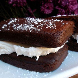 <p>Named for the daughter of the Continental Baking Company (a parent company of Hostess), <a href="http://www.loveandflour.com/cakes/suzy-q%E2%80%99s-for-susie-k" target="_blank">Suzy Qs</a> and their devil's food sandwiched around a cream center are tasty treats for anyone (especially when made at home!).</p>