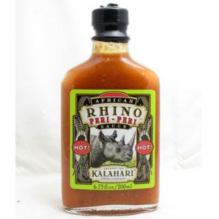 <p>Named after the pepper that gives it its  spicy heat, peri-peri hot sauces are a type of sauce used throughout the cuisines of several regions of Africa, and which are now getting wider distribution and gaining popularity in other parts of the world. Made with the peri-peri pepper (otherwise known as the African bird's eye chili), this sauce, which also contains vinegar and tomatoes, packs more heat than a jalapeño-based variety, but is not so intensely fiery as sauces made with habañeros or Ghost Peppers.</p>
<p><a href="http://www.armadillopepper.com/African-Rhino-Peri-Peri-Pepper-Sauce-Hot-PPS-AFH.htm?gclid=CP-RiLPb2bcCFUyY4AodoEsAtg" target="_blank">armadillopepper.com</a></p>