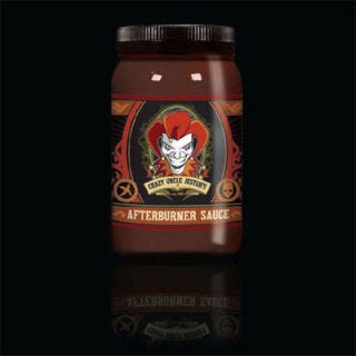 Dessert Sauces <p>Crazy Uncle Jester's® is a company you may not have heard of before, but the Native American-owned specialty food manufacturer (which is currently making an effort to go totally green and leave no carbon footprint) is making products that are all-natural and use no artificial colors, flavors, or preservatives — and which, of course, are also totally delicious. The company's addictively sweet and hot Afterburner Sauce is a hot fudge infused with the fiery heat of habanero peppers, giving the sweet and creamy dessert topping a surprisingly spicy kick. This sauce won a Scovie Award in 2009 and the Golden Chile Award at the National Fiery Food Challenge in 2010, so the combination is clearly working for a growing base of fans.</p>
<p><a href="http://www.crazyunclejester.com/products/Crazy_Uncle_Jester_s_AfterBurner_Sauce-5-4.html" target="_blank">crazyunclejester.com</a></p>