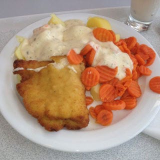 In the fourth season premiere, Don Draper sups on chicken kiev, a pounded chicken breast stuffed with garlic herbed butter, breaded, and deep-fried.