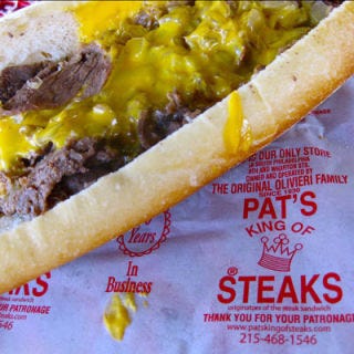 Cheesesteaks have become known across the country, but a legitimate, authentic version must be made from thinly-sliced chipped steak, come on a long, skinny Philadelphia roll, and should be covered "wit wiz" — Cheez Whiz, that is. Sought-after steak sandwich destinations include <a href="http://www.tonylukes.com/" target="_blank">Tony Luke's</a>, <a href="http://www.patskingofsteaks.com/" target="_blank">Pat's King of Steaks</a>, and <a href="http://www.genosteaks.com/" target="_blank">Geno's</a>.