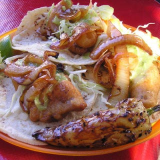 The undisputed destination for tacos de pescado is San Diego, because of its proximity to Baja California, the region of Mexico where this handheld meal was first created. Head to the original, <a href="http://www.rubios.com/" target="_blank">Rubio's</a>, for a taste of battered, fried fish, dressed with cabbage and sauce on a tortilla.