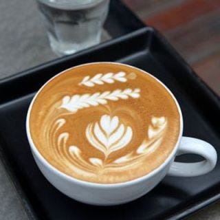 <p>Almost all of us have seen a barista finish off our latte rosetta with a flick of the wrist, which is impressive enough first thing in the morning. Some baristas, including this award-winning one, keep the theme but embellish their lattes even further.</p>
<p>Served at <a href="http://www.ristr8to-coffee-chiangmai.com/" target="_blank">Doppio Ristretto</a> in Chiang Mai, Thailand.</p>