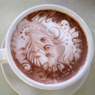 <p>There's no need for you to miss the fun just because you're not a coffee drinker. Order a frothy hot chocolate and you just might find an abstract etching like this one.</p>
<p>Made by <a href="http://www.dubseacoffee.com/" target="_blank">Dubsea Coffee</a> in Seattle.</p>