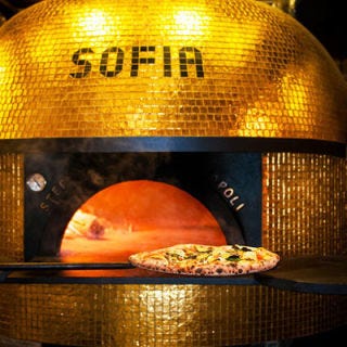 Buona Forchetta; San Diego Named Sofia, after co-owner Matteo Cattaneo's first daughter, the wood-fired oven at this Neapolitan-style pizzeria was handmade in Naples by the master artisan Stefano Ferrara over the course of nearly five months, then shipped to San Diego. Cattaneo's wife, Alexa Kollmeier, insisted on covering the oven with golden tiles, which add to its gorgeous warm glow. "She is always right," Cattaneo says. Must try: The sweet-salty-creamy Michelle, a white pizza topped with crème fraîche, <i>speck</i>, caramelized onions, Gorgonzola and thyme.
<br /><br />
<a href="http://www.containerstore.com/welcome.htm" target="_blank">containerstore.com</a>