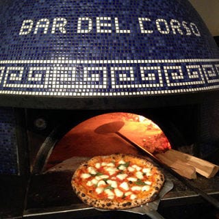 Bar del Corso; Seattle This Aegean-blue oven was hand-built and tiled by Raffaele Vassallo (a.k.a. Lello) — an apprentice of Stefano Ferrara's equally masterful father, Natale — in Naples. While being forklifted into the restaurant — a wall had to be removed in order to make way for it — the oven's heft became too much for the sidewalk, which cracked and caved. Today the oven stands on firm ground, producing Neapolitan-style pizzas. Must try: Corno di Capra with house-made sausage, pickled peppers, garlic, mozzarella and Grana Padano, a hard, salty Italian cheese.
<br /><br />
<a href="bardelcorso.com" target="_blank">bardelcorso.com</a>