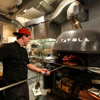 A Tavola; Cincinnati This Neapolitan-inspired restaurant's massive, black Stefano Ferrara-made oven weighs "about as much as a small school bus," according to co-owner Nicolas Wayne. The wood-burning oven can reach a temperature of 1,200 degrees and cook pizzas in just 90 seconds. Must try: Fig + Prosciutto, a sweet-savory pie topped with fig jam, prosciutto, Fontina cheese and arugula salad.
<br /><br />
<a href="atavolapizza.com" target="_blank">atavolapizza.com</a>