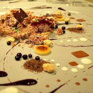 <p>Molecular gastronomy is frequently talked of as art, and nowhere is this more literal than at Alinea. Chef Grant Achatz plates your dessert directly on the table, culminating in a work reminiscent of abstract paintings hanging in modern museums. Watch the entire process <a href="http://www.youtube.com/watch?v=afGpptxz_qE" target="_blank">here</a>.</p>
<p><strong>Alinea:</strong> 1723 N Halsted St, Chicago, IL 60614; 312-867-0110; <a href="https://content.alinearestaurant.com/html/index.html" target="_blank">alinearestaurant.com</a></p>