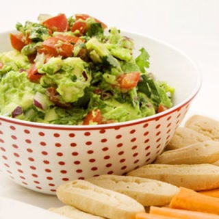 <p>Whether you're using the chips as a front for all-out guacamole consumption or they're actually an important part of your snack lineup, one thing is sure, you can't skimp on the guac. Luckily, there's a recipe out there for everyone. Do some pre-game research and draft your favorite for the big day.</p>
<p><strong>Recipes: <a href="http://gogonow.org/recipefinder/gorgeous-guacamole-recipe-rbk0912%22 target="_blank">Gorgeous Guacamole</a></strong> (pictured), <strong><a href="http://gogonow.org/recipefinder/skinny-guacamole-recipe-ew0612%22 target="_blank">Skinny Guacamole</a>, <a href="http://gogonow.org/recipefinder/thai-guacamole-sesame-scallion-recipe-fw0214%22 target="_blank">Thai Guacamole with Sesame and Scallions</a></strong></p>