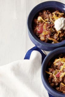 Chili and Cornbread <p>Chili's a hearty dish, but you're still always going to make room for a generous hunk of fresh cornbread. Whether you refer meat-packed or vegetarian chili, the key is the spice. The secret to this chili with a kick is a generous helping of bourbon and a sprinkle of lemon zest in the sour cream for a fresh, finishing flavor.</p>
<p><strong>Recipe: <a href="http://gogonow.org/recipefinder/brians-bourbon-chili-recipe-clv1012%22 target="_blank">Brian's Bourbon Chili</a></strong> (pictured), <strong><a href="http://gogonow.org/recipefinder/three-chile-beef-chili-recipe-fw1013%22 target="_blank">Three-Chile Beef Chili</a>, <a href="http://gogonow.org/recipefinder/two-bean-harvest-chili-recipe-ghk0912%22 target="_blank">Two-Bean Harvest Chili</a></strong></p>