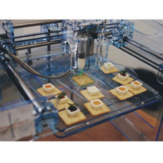 First demonstrated at the <a href="http://www.makerfaireyyc.ca/" target="_blank">Calgary Mini Maker Faire</a>, Brian Queen 's process for 3D printing with food resulted in these gorgeous little goat cheese canapés, finished with a number of pretty and colorful fillings.