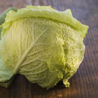 <p>The hearty star of cole slaw and savory salads has another talent — it can last up to two weeks or longer, says Lindsay Malone, RD, of the Cleveland Clinic. The leafy green's life span is credited to its low production of ethylene, a chemical that causes ripening, and its many layers, she explains. To keep cabbage fresh that long, JJ Virgin, author of <a href="http://www.amazon.com/The-Virgin-Diet-Foods-Pounds/dp/0373892713/ref=sr_1_1?ie=UTF8&qid=1387168517&sr=8-1&keywords=the+virgin+diet" target="_blank"><em>The Virgin Diet</em></a>, recommends storing it in a perforated plastic bag in your fridge's crisper drawer. One more tip: Cut and wash the vegetable only when you're ready to chow down. </p>